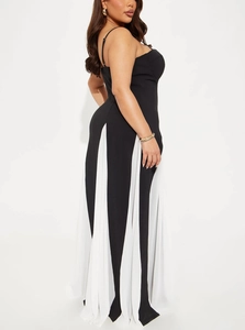 Detail of slim-fit contrast maxi dress with black and white pleated color-blocking design