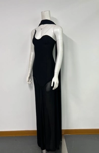 Detail of the chic strapless evening dress with neck wrap and sheer mesh patchwork hem