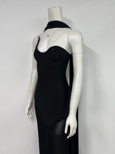 Detail of elegant black tube top evening dress with mesh stitching and matching neck scarf