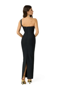 Back view of a sleek black mermaid dress with invisible zipper and elegant back slit detail