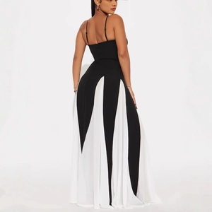 Detail of slim-fit back with invisible zipper on contrast black and white maxi dress