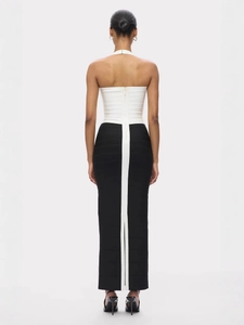 Elegant halter neck bodycon dress with black and white contrast and back slit detail