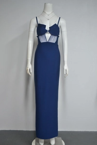 Detail view of navy blue dress with mesh patchwork and unique waist cutout design