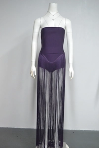 Detail view of purple strapless bandage dress featuring dense vertical fringe layers
