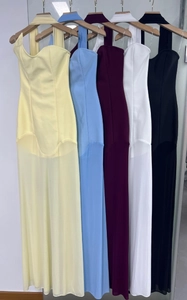 Detail view of five colors of halter neck evening dresses with mesh patchwork panels