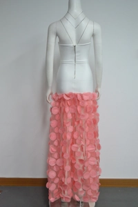 Detail of back metal zipper on white bodice and 3D pink floral tulle skirt