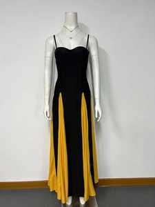 Detail of sweetheart neckline and yellow contrast godet pleats on slim fit maxi dress