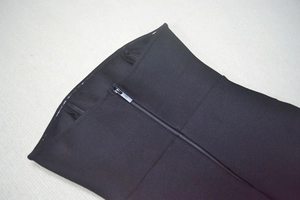 Detail of high-waisted shaper with side zipper, inner hooks and anti-slip silicone strips