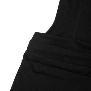 Detail shot of the ruched waist design on a black deep V-neck slim fit dress