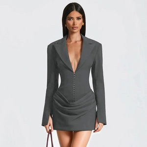 Detail of dark grey V-neck blazer dress featuring metallic hook closure and ruched pleats