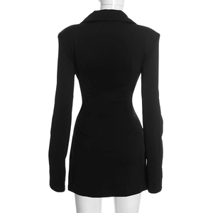 Back view of a black long sleeve mini dress featuring a tailored waist and blazer collar style