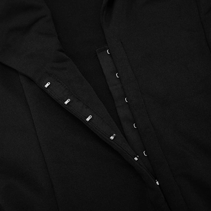Detail view of the multi-row hook-and-eye closure on black bodycon dress fabric