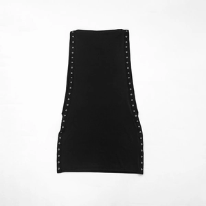 Detail of silver metal eyelets on the side seam of a black sleeveless bodycon dress