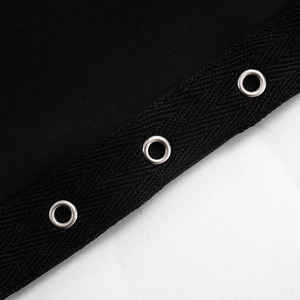 Detail of silver eyelets on black knit fabric with reinforced herringbone tape trim