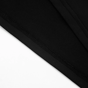 Detailed close-up showing the precise stitching and ribbed texture of a black sleeveless dress