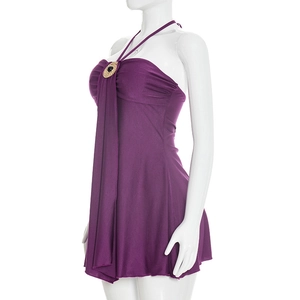 Detail of purple halter dress featuring gold-rimmed black stone ornament and draped fabric