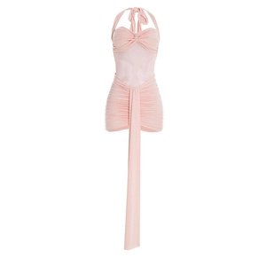 Detail of pink halter neck dress featuring ruched fabric and a long decorative ribbon