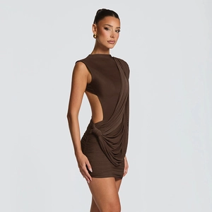 Detail of the waist cut-out and draped knot design on this slim dark brown dress