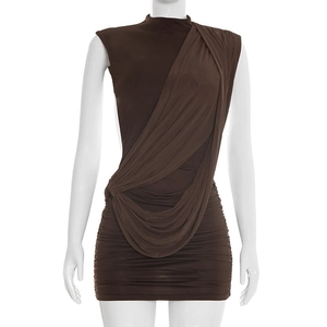 Detail of elegant draped pleats and asymmetrical design on the brown sleeveless mini dress