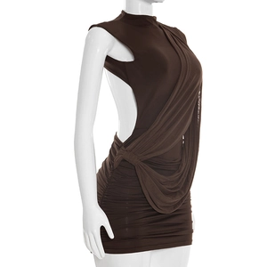 Detail view of the chocolate brown sleeveless dress with draped pleats and open back