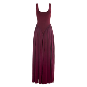 Detail of burgundy sleeveless dress featuring a fitted bodice and pleated chiffon hem