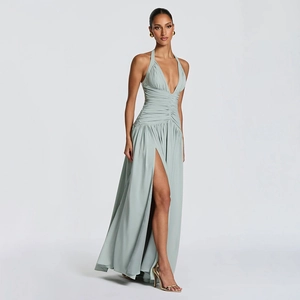 Elegant mint green halter V-neck maxi dress with pleated waist and high side slit detail
