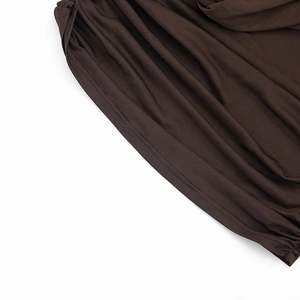 Detailed view of the dark brown sleeveless dress featuring fine stitching and smooth fabric