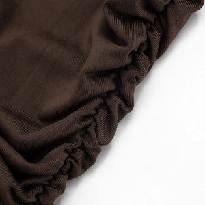 Detail of dark brown ribbed knit fabric with elastic shirring and fine texture