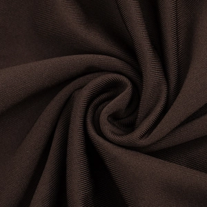 Close-up of deep coffee ribbed knit fabric showing texture and soft drape detail
