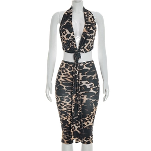 Detail of leopard print halter crop top and skirt set with front tie knot feature