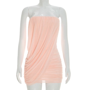 Detail of ruched mesh fabric on a slim fit strapless light pink mini bodycon dress