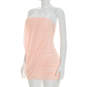 Close-up of light pink ruched mini dress showing asymmetric draped mesh fabric detail