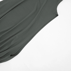 Close-up of double-needle stitching and charcoal gray fabric texture on sleeveless dress