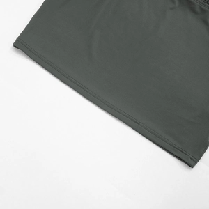 Detailed close-up showing double-needle hem stitching on charcoal grey mini dress