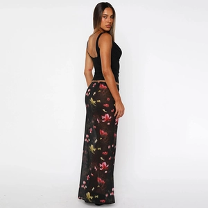 Detail of high waist floral chiffon maxi skirt and slim fit sleeveless black tank top