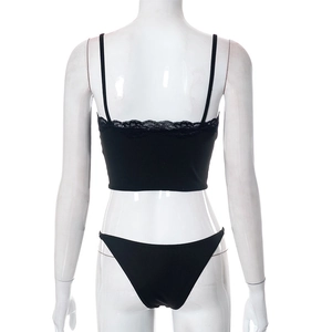 Back view of a black two-piece lingerie set featuring delicate eyelash lace trim details