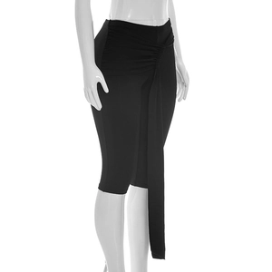 Detail of high waist slim fit black pants with elegant front pleats and long drape ties