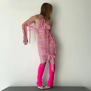 Detailed view of the light pink multi-strap deconstructed mesh top with criss-cross laces