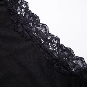 Detailed macro view of the intricate black lace trim and texture on the summer camisole