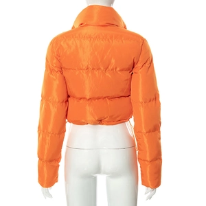Back view of bright orange cropped puffer jacket with stand collar and quilted pattern