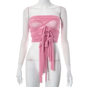 Detailed view of pink mesh wrap top with multi-layer crisscross ties and sheer fabric texture