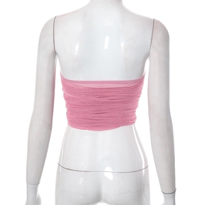 Detail view of pink mesh tube top with layered ruffles and back lace-up design