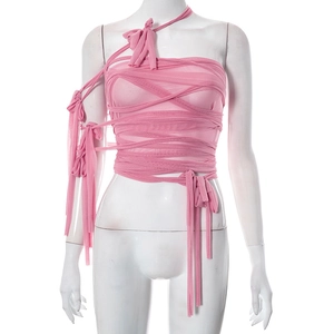 Detailed view of the layered pink mesh texture and bow-tie neck of the crop top