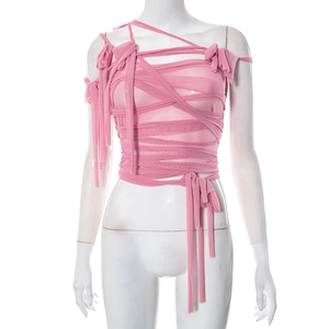 Detail of pink deconstructed mesh top featuring multi-strap bandage design and ribbon knot