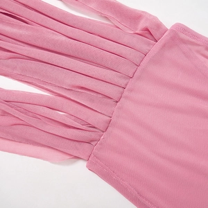 Close-up detail of pink mesh cropped top showing textured fabric and fringe strap design
