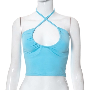 Detail of light blue criss-cross halter neck top with pleated neckline and seams