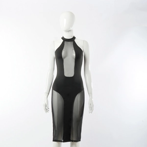 Slim fit black halter dress with sheer mesh panels and cut-out details on a mannequin
