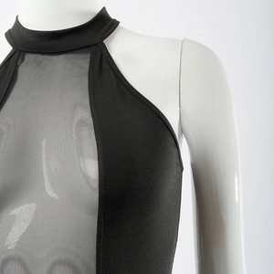 Detail of high neck black sleeveless top with sheer mesh V-panel stitching and slim fit