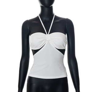 Detail of white halter neck top with chest ruching and waist triangular cut-out design