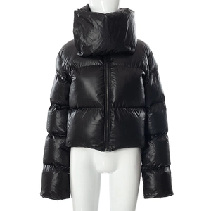 Detail of glossy black padded jacket showing stand-up collar and quilted texture